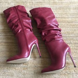 Red knee high boots.